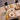 Giara bottle on a set table with food and glasses