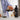Pouring coffee concentrate from the Rapid Brewer carafe into a glass