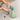 Ototo Soapasaurus soap dispenser on a bathroom counter