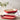 Le Creuset Rectangular Dish with Platter Lid in Cerise (Cherry red), styled with food on the platter lid