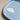 Close-up of the blue base of the Cloud Butter Dish with a white cloud