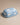 Blue Cloud Butter Dish with the lid on, on a beige surface