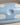 Close-up of the speckled blue lid with white clouds