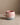 Cloud Sunset Ball Mug on a beige stone surface
