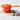 Le Creuset 1.75 Qt. iron handle sauce pan with a flame design, featuring a sturdy handle and smooth cooking surface.