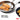 OXO stainless steel turner lifting a salmon fillet from a skillet