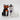 Black cat in an orange mask and white cat in a witch hat, Cosmos Gifts salt and pepper shakers