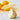 Set of three BEES WRAP beeswax food wraps with lemons, reusable storage wraps for fresh food preservation.