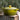 Le Creuset 5.5-quart round Dutch oven in olive green with a sturdy lid, designed for versatile cooking and hearty meals.