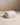 White Party Butter Dish with domed lid on a beige surface
