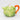 Cosmos Gifts leafy green teapot with a white bunny on top and an orange handle