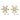 Champagne snowflake tree topper with its warm LED lights lit