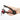 Hand squeezing the black OXO cherry and olive pitter with a cherry in the cup