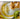 Kyocera 3.5-inch ceramic grater with stainless steel handle for grating cheese, vegetables, and spices.