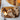PROTEAK rounded edges serving board, a stylish wooden cutting board with smooth, rounded edges for kitchen serving and prep.