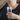 Woman opening a wine bottle with the TableCraft winged corkscrew