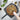 Epicurean 23x14-inch pizza peel with wooden handle for easily transferring pizzas in the kitchen.