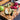 PROTEAK Teakhaus herringbone edge grain cutting board with juice canal, showcasing polished teak wood and built-in food preparation features.