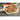 Vegetable pizza on the Fantes pizza peel on a countertop