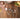 Measuring spoons with salt and spices on a wooden counter