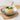 HIC bamboo steamer basket with multiple tiers for steaming vegetables, dumplings, and seafood in traditional kitchen style
