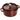 Staub round cocotte in Grenadine, lid on, side view