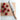 Shun Classic Blonde santoku on a cutting board with radishes