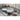 Cuisinart Chef's Classic stainless saucepan on a gas cooktop with its cover alongside