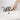 Small brush's wiper blade scraping the edge of a sink