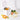 OXO white 0.75 gallon compost bin with lid open, filled with vegetable scraps