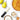 OXO corer with a pear core in it beside pears and a pear tart