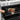 Oxo silicone oven mitt with textured surface for heat protection and easy grip, designed for safe handling in the kitchen.