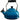 Le Creuset whistling tea kettle with a rounded handle and vibrant enamel finish on a stovetop.