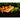Salmon and vegetables on the charcoal Emile Henry grilling stone