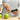 Hand pulling the removed core from the OXO corer over green apples