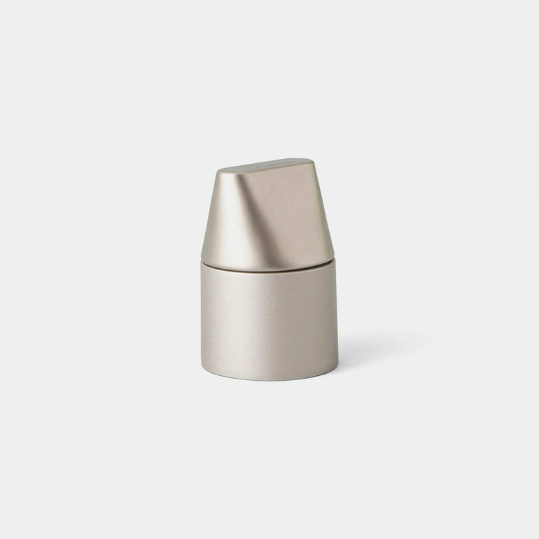 METROKANE Champagne Preserver, a device designed to keep champagne bottles fresh and bubbly after opening.