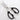 Black Messermeister take-apart kitchen shears open on white marble