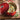 Le Creuset 5-quart oval Dutch oven in vibrant enameled cast iron with lid, ideal for slow cooking and braising.