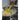 Get it Right Ultimate Spoonula spatula in yellow, versatile kitchen tool for cooking and baking, shown in a lifestyle setting.