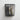 Black reusable silicone half-gallon storage bag by Stasher, shown with bug spray inside, designed for eco-friendly food storage.