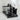 Black Yamazaki tower drain basket dish rack with a sleek, minimalist design for drying dishes and utensils.