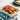Le Creuset Rectangular Dish with Platter Lid — overhead lifestyle gallery shot showing the dish in use