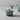 Le Creuset 1.75 Qt iron handle sauce pan with a black lid and sturdy iron handle, perfect for cooking sauces and small dishes.
