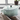 Le Creuset 6.75qt oval Dutch oven with colorful enameled cast iron finish, featuring a sturdy lid and ergonomic handle.